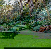 EG Waterhouse National Camellia Gardens - Accommodation Gladstone