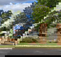 The Fossilised Forest Sculpture - Accommodation Gladstone