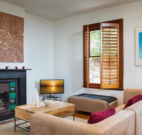 Chic Two-storey Cottage with Darling Harbour Views - Accommodation Gladstone