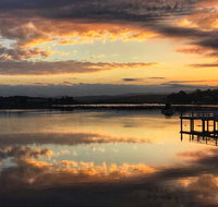 Reflections on Merimbula Lake - Accommodation Gladstone