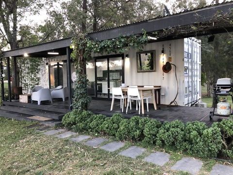 Absolute Riverfront Shipping Container Cabin - Accommodation Gladstone 0