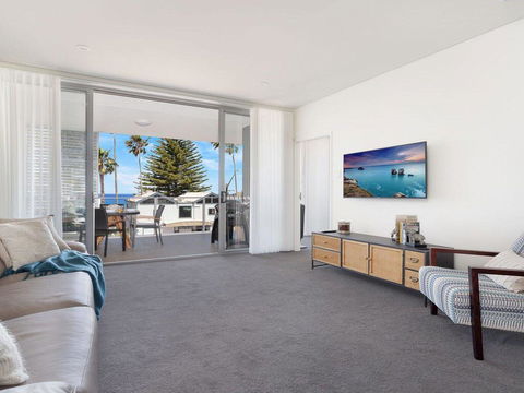 Bathers At The Beach - Across From Surf Beach - Accommodation Gladstone 1