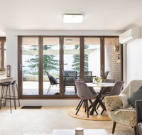 Beachfront Manly Apartment With Parking and Balcony - Accommodation Gladstone