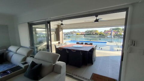 Relax Poolside By The Canal - Accommodation Gladstone 0
